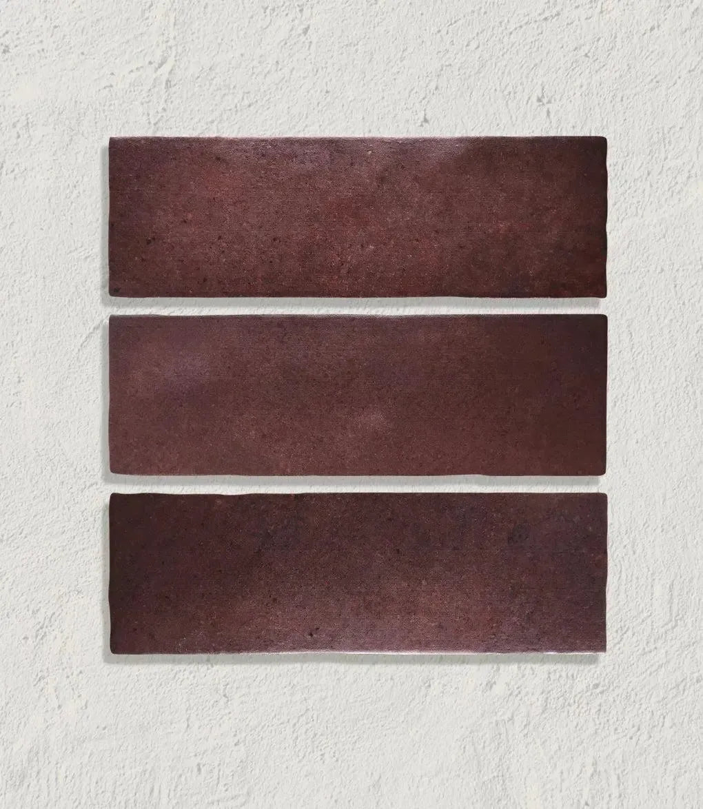 lava burgundy 6 5cm x 20cm lava burgundy by baked tiles featured in a beautiful interior