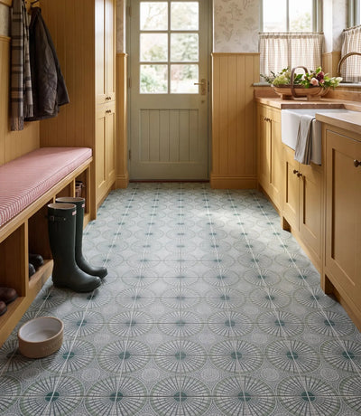 solstice green 20 x 20cm solstice green tiles on a boot room floor with ochre panelled cabinetry belfast sink wellies and dog bowl