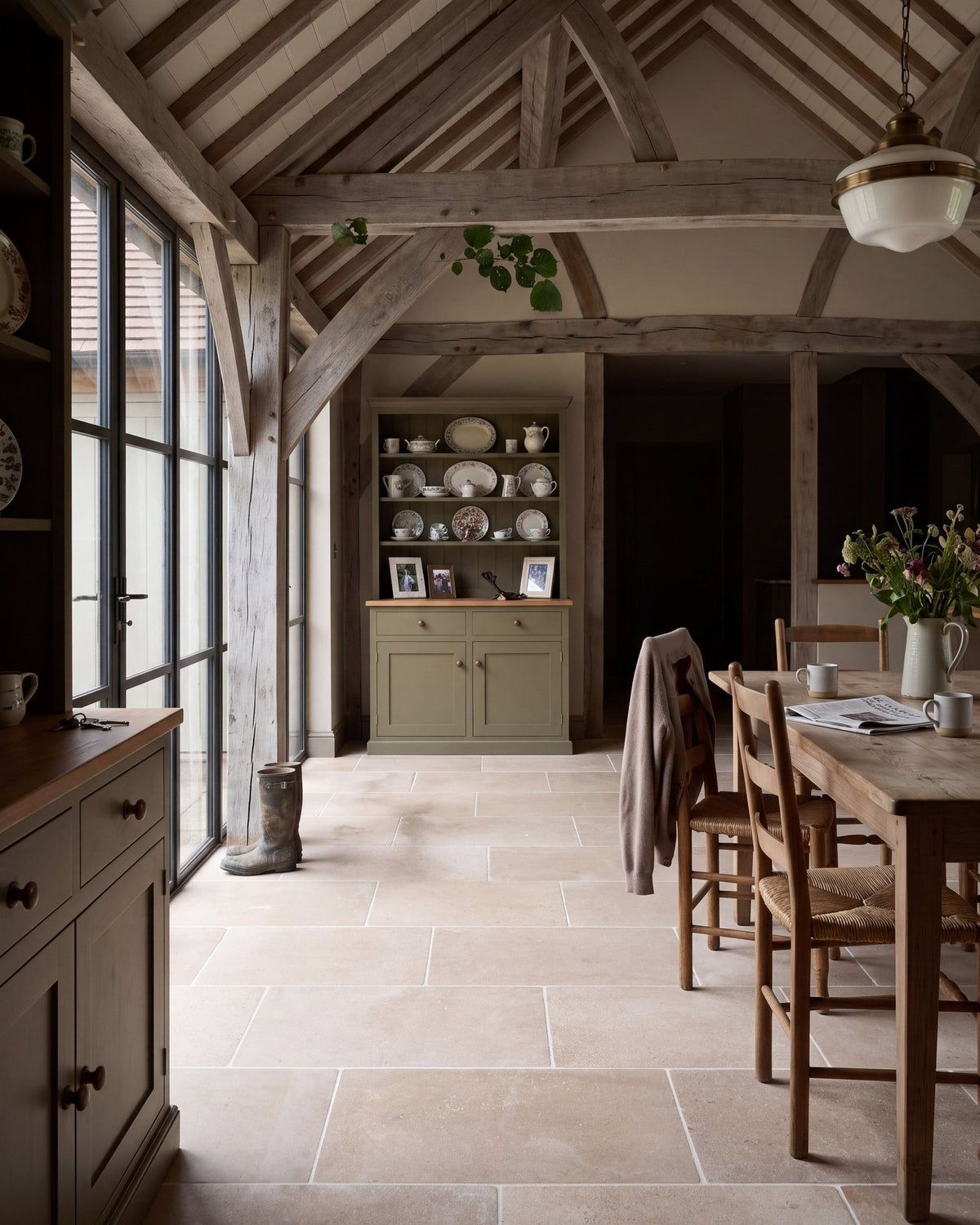 Oak-framed kitchen diner with a Bibury Stone Fosse Way limestone floor